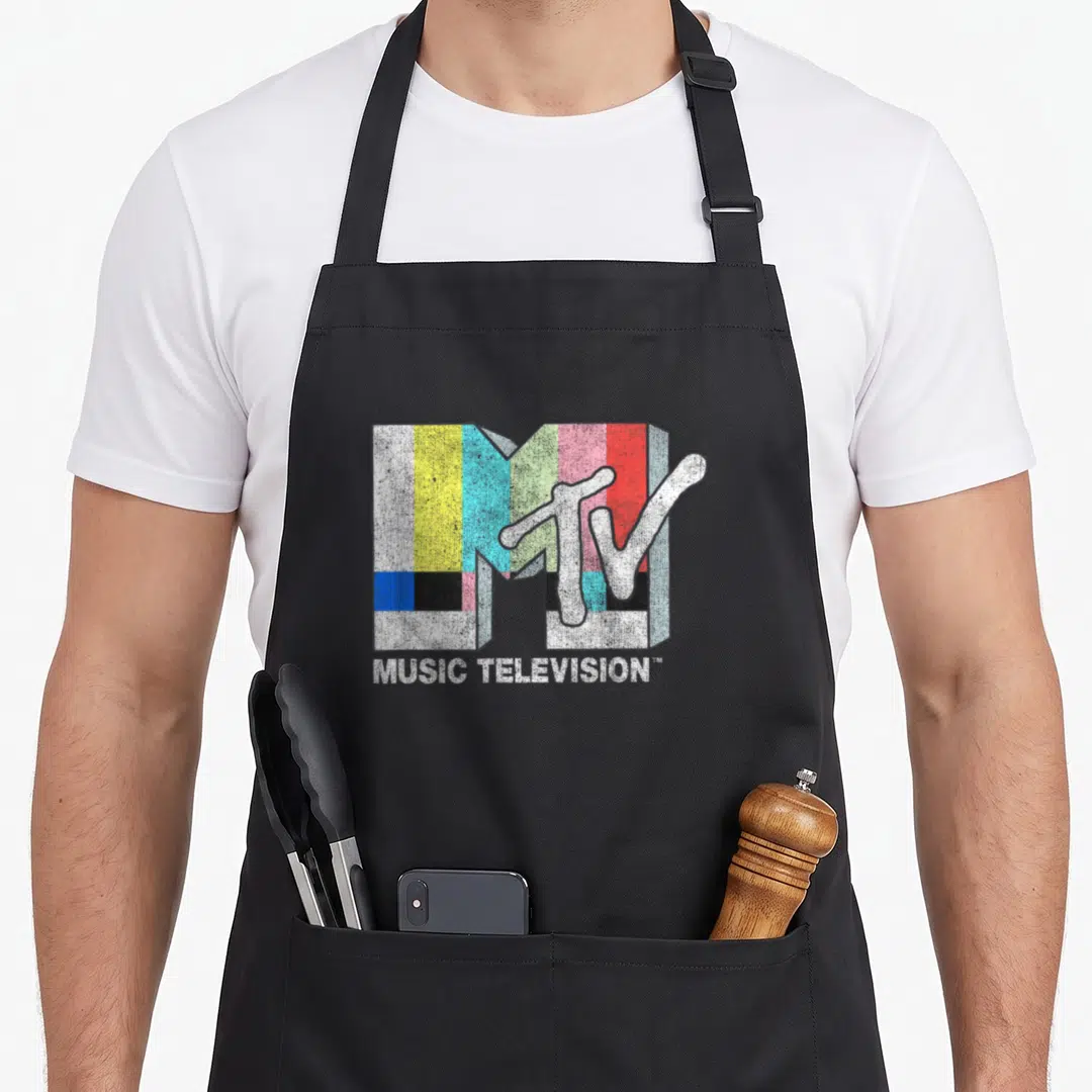 Mtv tv apron - Distressed 3D MTV logo with color bars and white MUSIC TELEVISION text — shown on a black cotton canvas apron against a white background