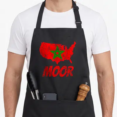 Fez american flag apron - Distressed red USA map with green star and red MOOR text — shown on a black cotton canvas apron against a white background