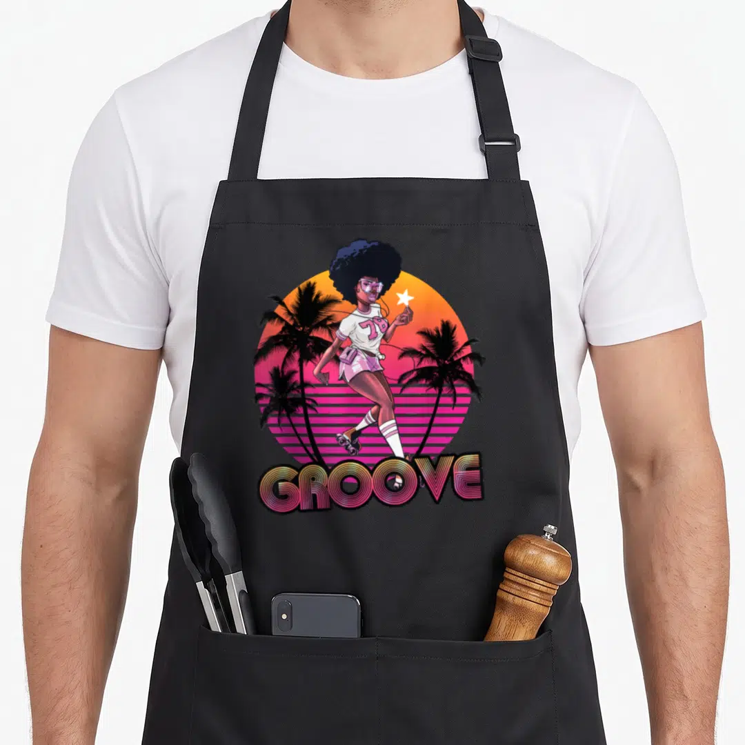 Afro 70s apron - Woman on roller skates with 78 GROOVE text and gradient sun — shown on a black cotton canvas apron against a white background