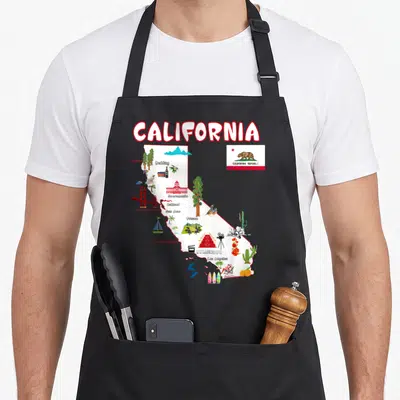 Map major apron - California map with city names, landmarks, and state flag in cartoon style — shown on a black cotton canvas apron against a white background