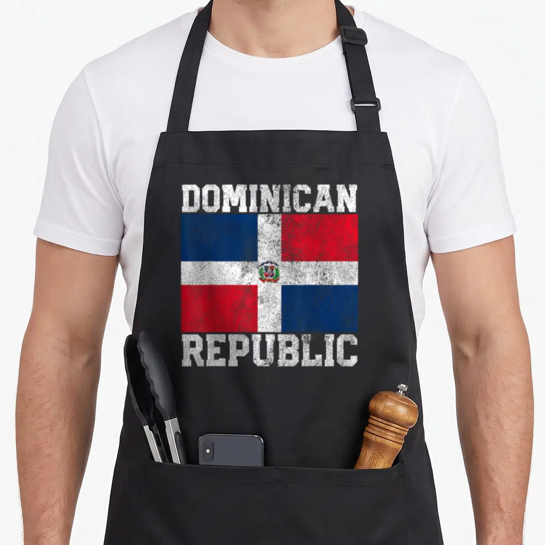 Republic country apron - Distressed Dominican Republic flag with text DOMINICAN REPUBLIC above and below — shown on a black cotton canvas apron against a white background