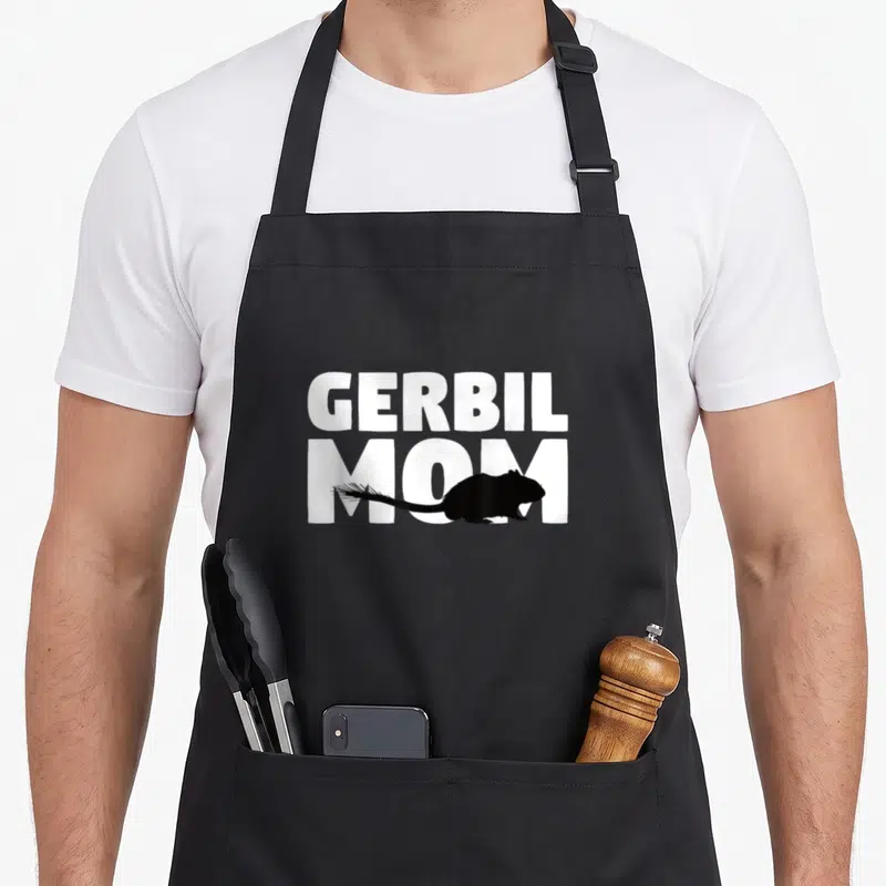 Gerbil mother's apron - White GERBIL MOM text with overlapping black gerbil silhouette — shown on a black cotton canvas apron against a white background