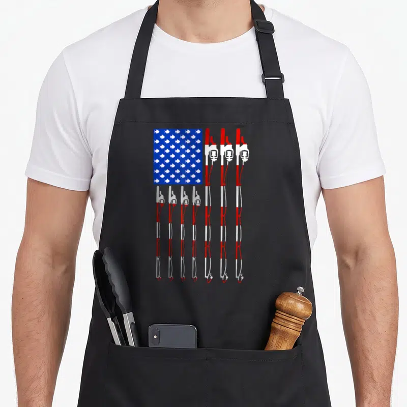 Pole american flag apron - Blue rectangle of white fish above eight red and white fishing rods — shown on a black cotton canvas apron against a white background