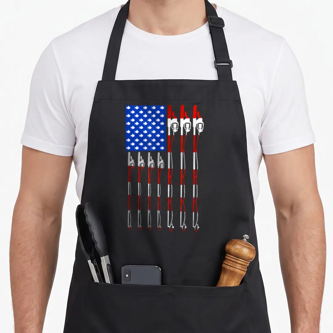 Pole american flag apron - Blue rectangle of white fish above eight red and white fishing rods — shown on a black cotton canvas apron against a white background
