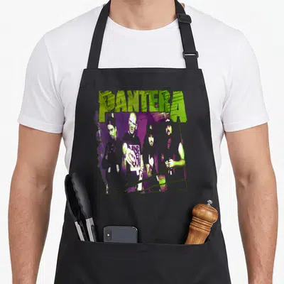 Pantera heavy metal apron - Distressed green and purple graphic of four band members under an arched logo — shown on a black cotton canvas apron against a white background