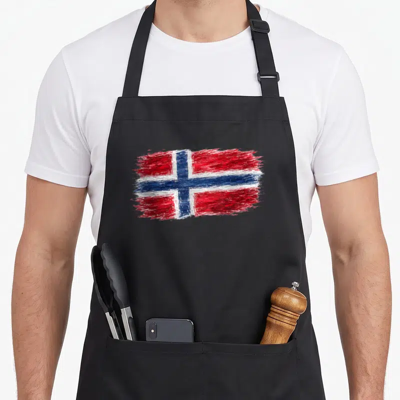 Norway football apron - Watercolor painting of the Norway flag in red white and blue with rough edges — shown on a black cotton canvas apron against a white background