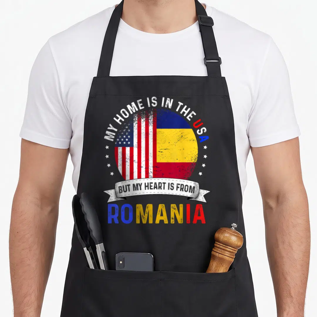 Patriot romanian apron - Globe split between US and Romanian flags with patriotic text and distressed texture — shown on a black cotton canvas apron against a white background