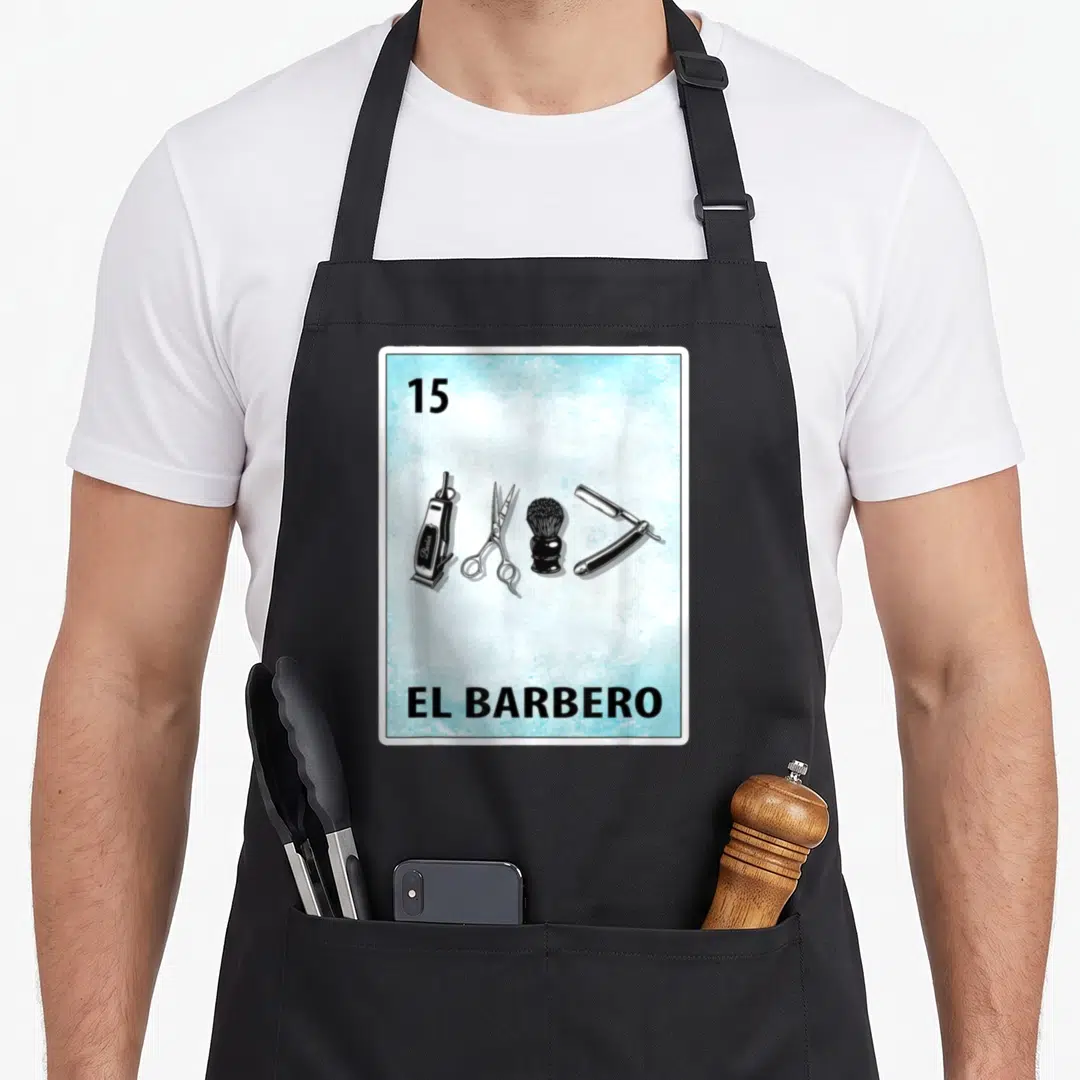 Barbero mexican apron - Number 15 card with clipper scissors brush and straight razor inside blue frame — shown on a black cotton canvas apron against a white background