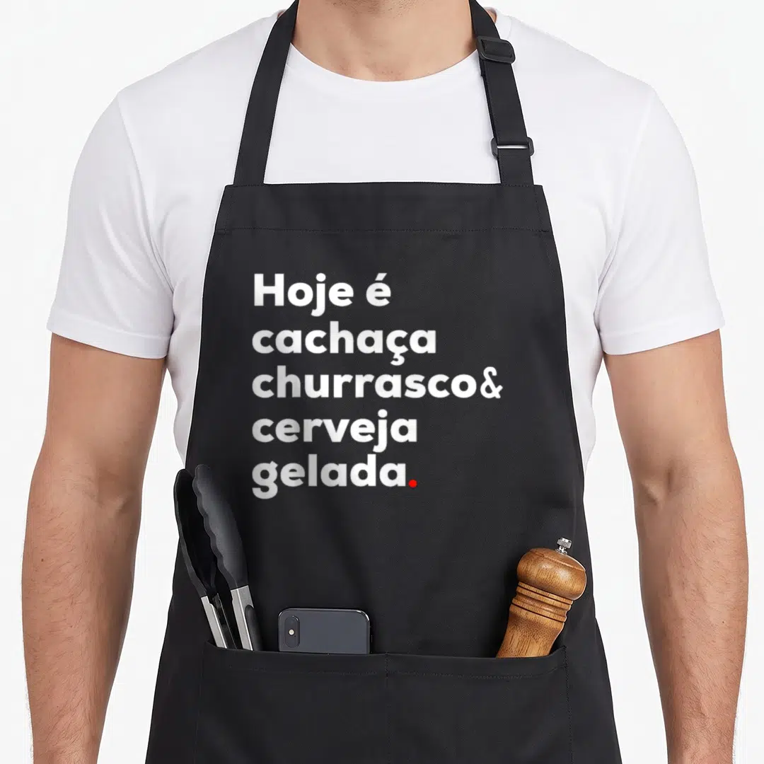Churrasco cachaca apron - Stacked white text reading Hoje é cachaça churrasco cerveja gelada with red period — shown on a black cotton canvas apron against a white background
