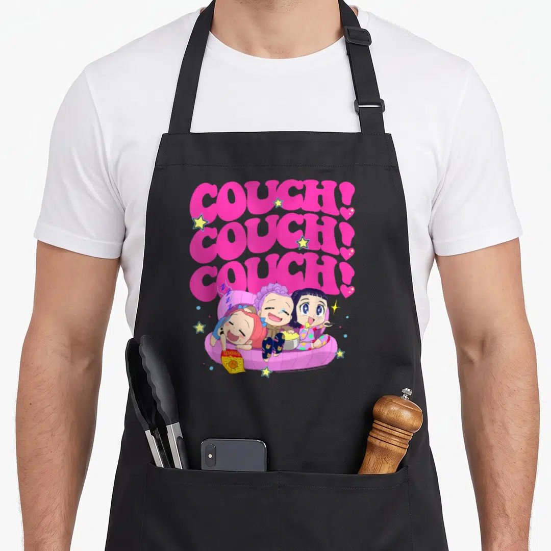 Poster couch apron - Three cartoon people on pink couch with snacks under stacked pink COUCH text and yellow stars — shown on a black cotton canvas apron against a white background