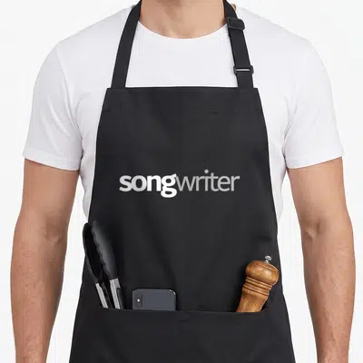 Songwriter minimalist apron - White and grey songwriter text on grey background — shown on a black cotton canvas apron against a white background