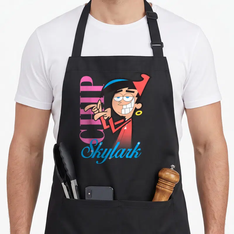 Fairly r aprons - Cartoon character pointing next to vertical pink CHIP and blue Skylark text with stars — shown on a black cotton canvas apron against a white background