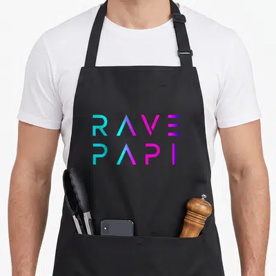 Papi daddy apron - Stacked RAVE PAPI text in cyan magenta purple gradient typography — shown on a black cotton canvas apron against a white background