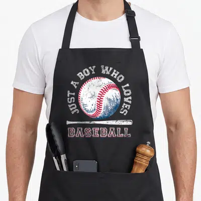 Sport baseball apron - Distressed baseball graphic with arched text and horizontal bat in white red blue — shown on a black cotton canvas apron against a white background