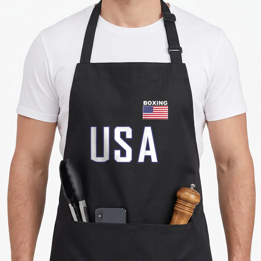 Flag training apron - BOXING text above a flag and large USA letters in white blue and red — shown on a black cotton canvas apron against a white background