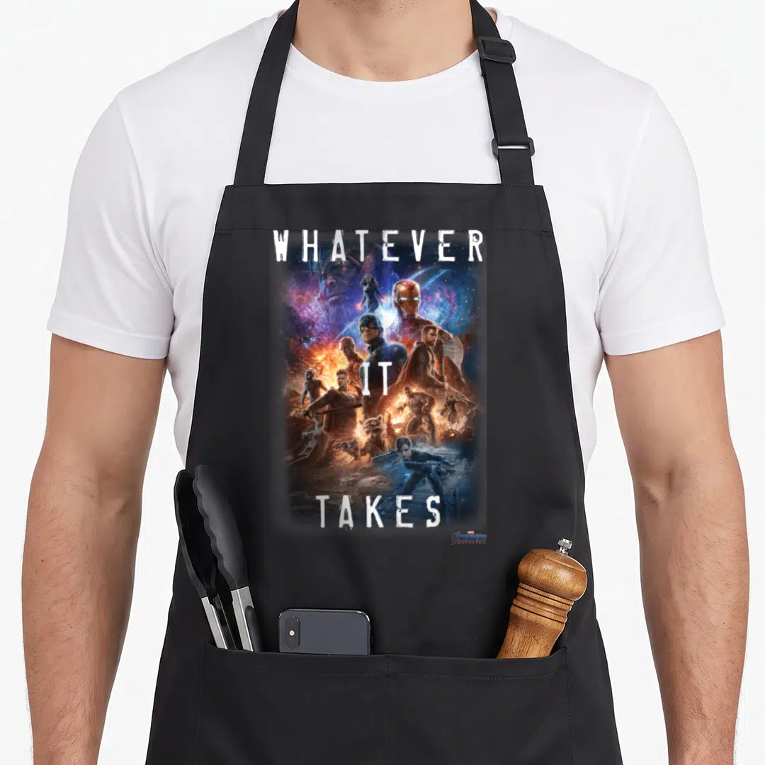 Endgame whatever apron - Avengers photo collage with white text WHATEVER IT TAKES framing characters in blue orange — shown on a black cotton canvas apron against a white background