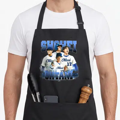 Mlboht5001 baseball apron - Blue SHOHEI and OHTANI text framing four photos of a baseball player wearing number 17 — shown on a black cotton canvas apron against a white background