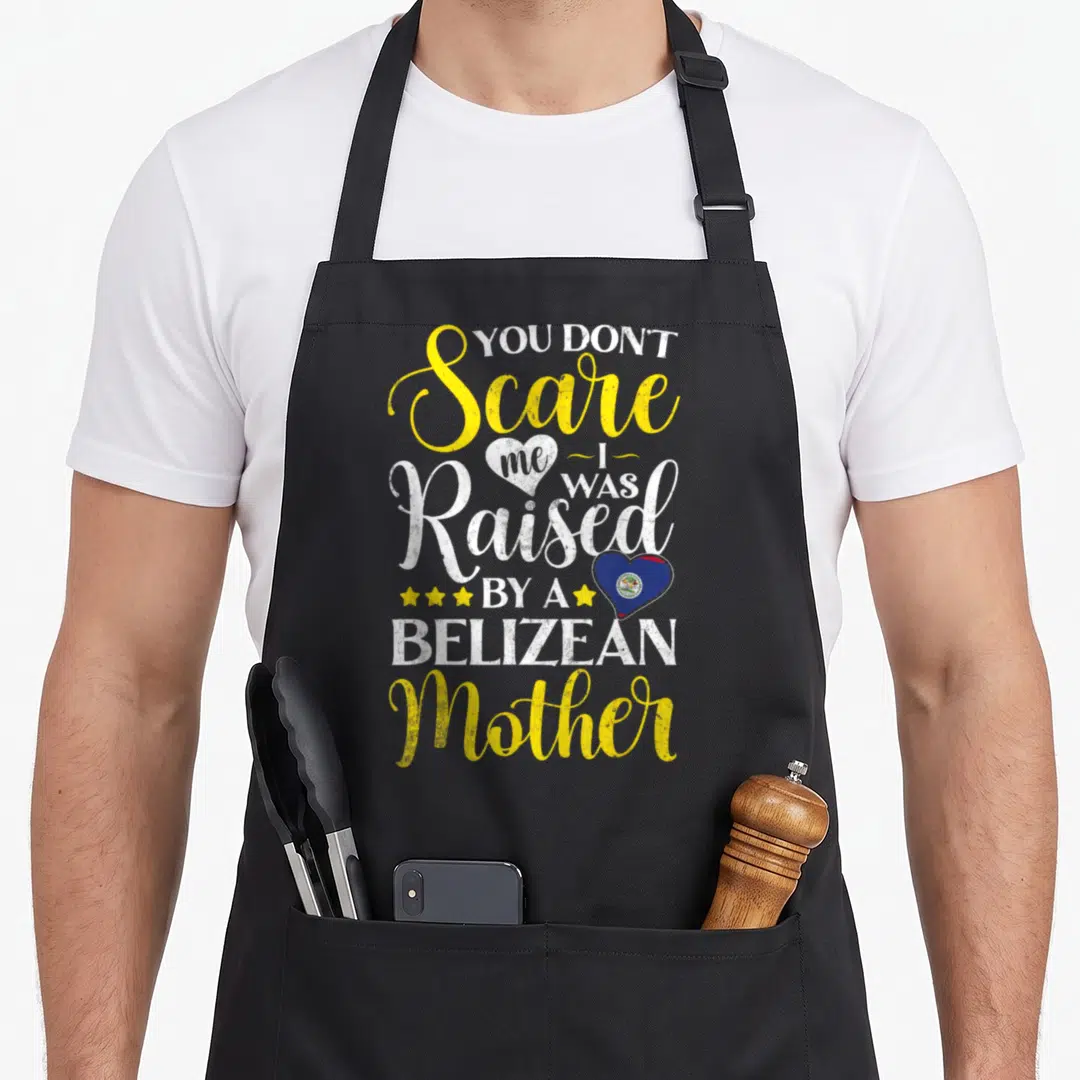 Flag belizean apron - Vertical yellow and white text with blue heart flag and four yellow stars — shown on a black cotton canvas apron against a white background