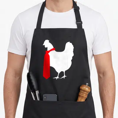 Japanese hen apron - White rooster silhouette facing left wearing a red necktie — shown on a black cotton canvas apron against a white background