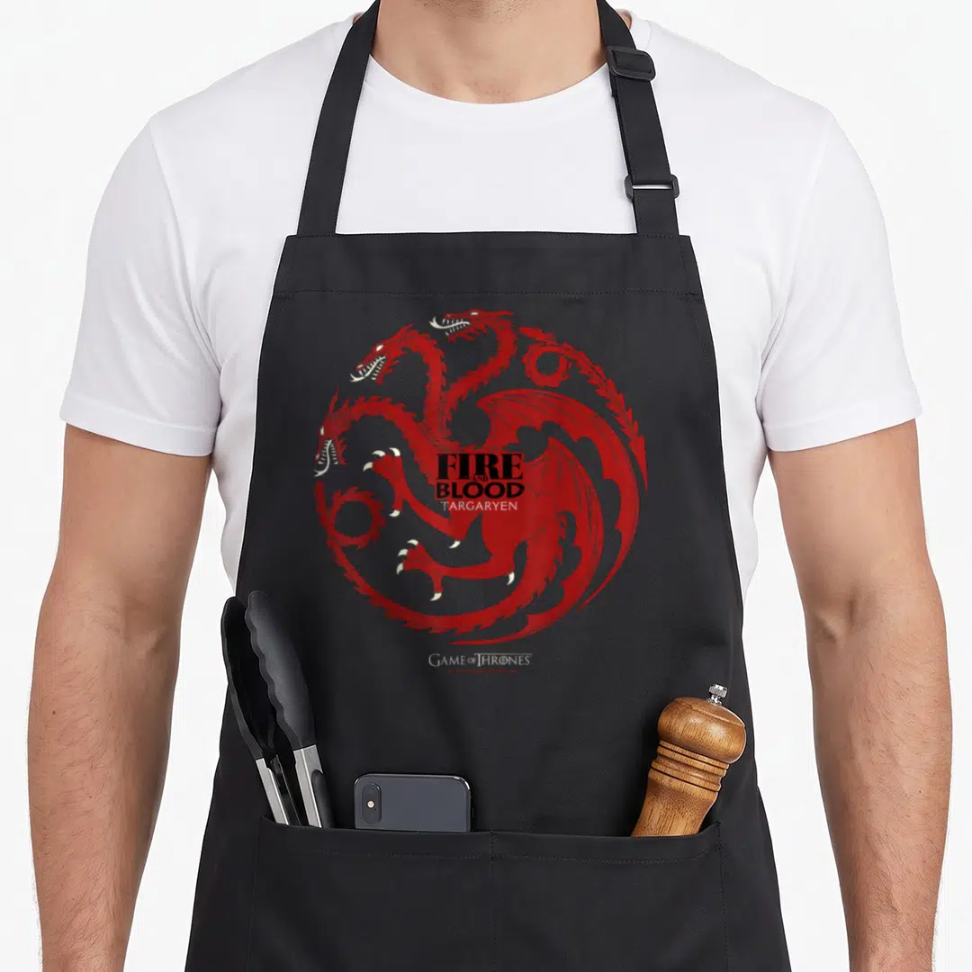 Fire blood apron - Red three-headed dragon circle with Fire and Blood Targaryen text in line art style — shown on a black cotton canvas apron against a white background