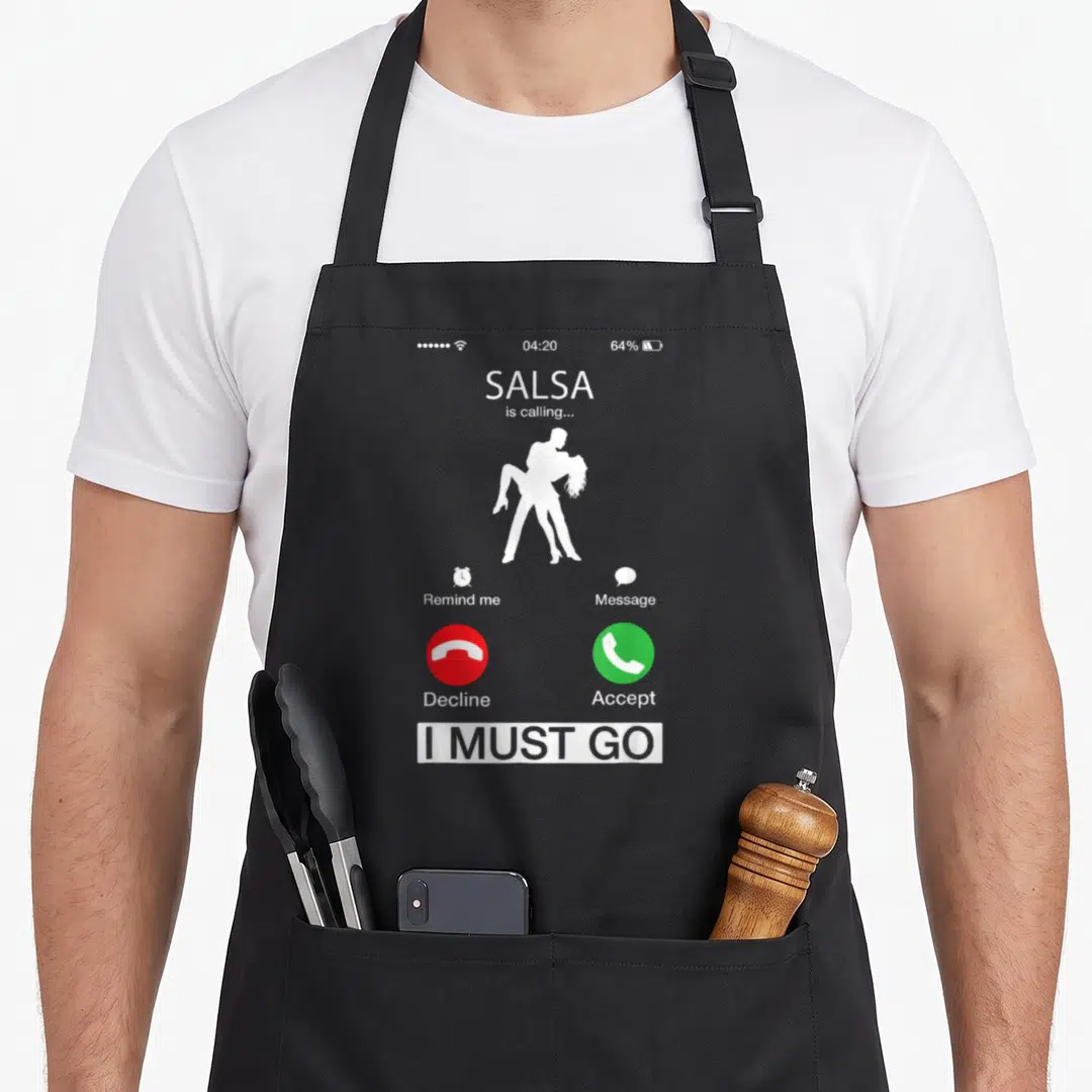 Salsa pico de gallo apron - Grey phone screen with SALSA caller ID, white dancer silhouette, red decline button — shown on a black cotton canvas apron against a white background