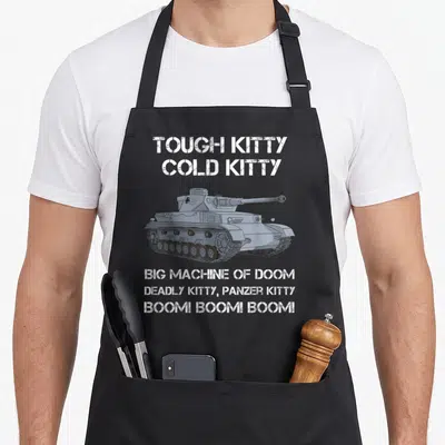Panzer meme apron - Grey tank illustration surrounded by white stenciled text reading Tough Kitty Cold Kitty Big — shown on a black cotton canvas apron against a white background