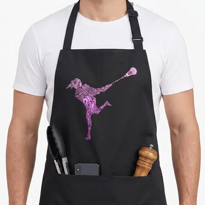 Funny youth lacrosse player apron - Pink mosaic silhouette of a lacrosse player made of gear icons — shown on a black cotton canvas apron against a white background