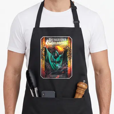 Dungeon guide master apron - Wizard in teal robe opening golden doors under DUNGEONS DRAGONS text — shown on a black cotton canvas apron against a white background