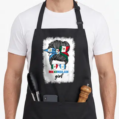 Mexico guatemala mexican apron - Cartoon woman bun with flag ribbon and MEXIMALAN girl text — shown on a black cotton canvas apron against a white background