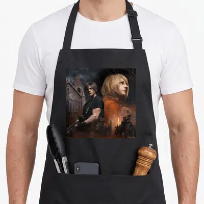 Leon ashley aprons - Man holding gun, large blonde woman face, stone church, zombies with torches, realistic style — shown on a black cotton canvas apron against a white background