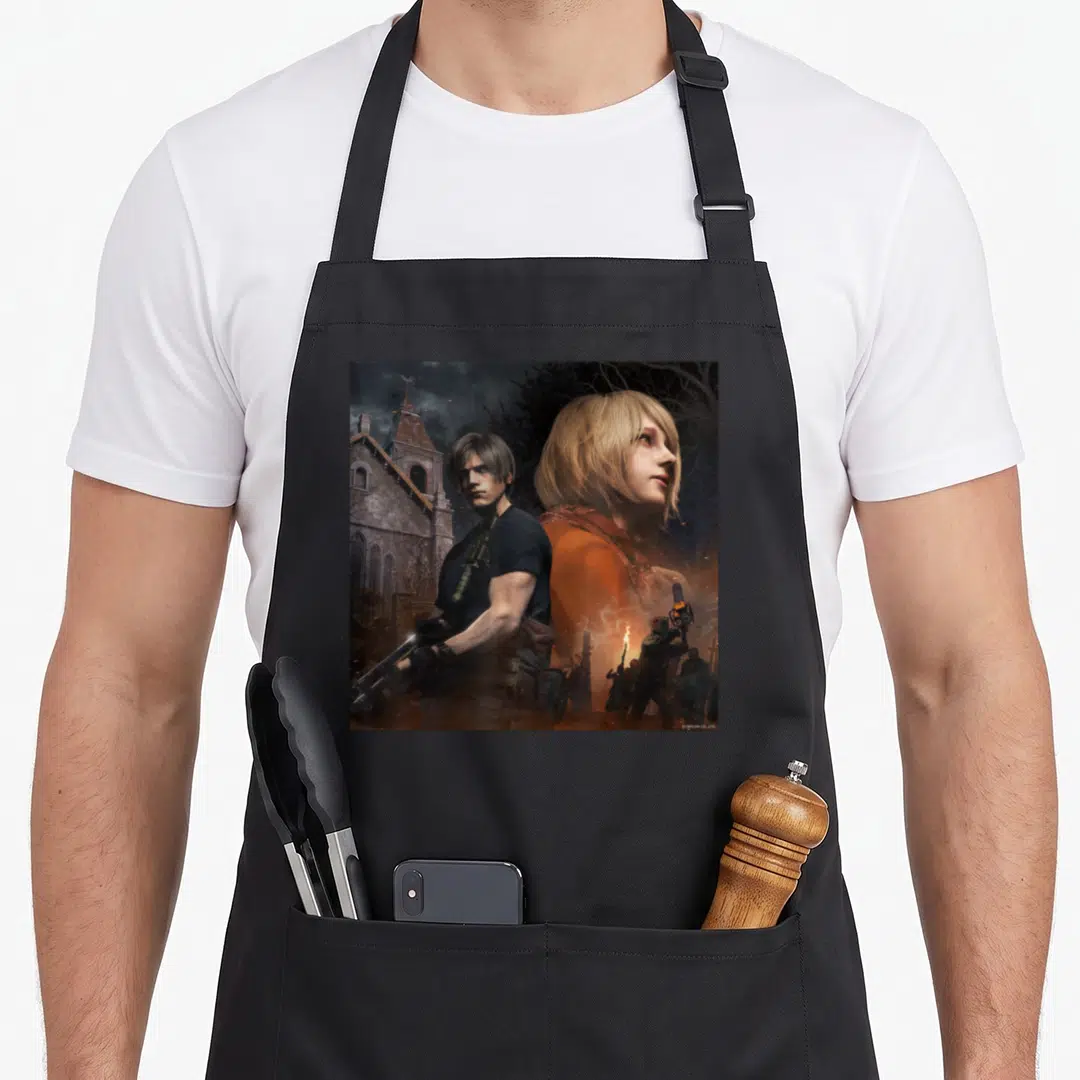 Leon ashley aprons - Man holding gun, large blonde woman face, stone church, zombies with torches, realistic style — shown on a black cotton canvas apron against a white background