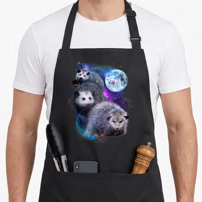 Moon mouse lover apron - Three grey and white opossums stacked vertically before a blue moon and purple nebula — shown on a black cotton canvas apron against a white background