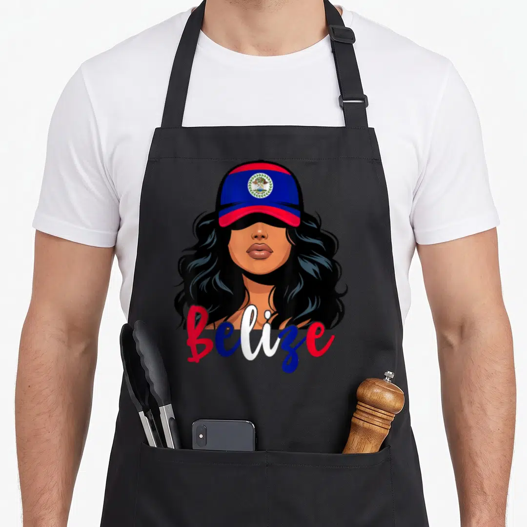 Belizean belize apron - Cartoon woman in red blue cap with Belize script text and coat of arms emblem — shown on a black cotton canvas apron against a white background