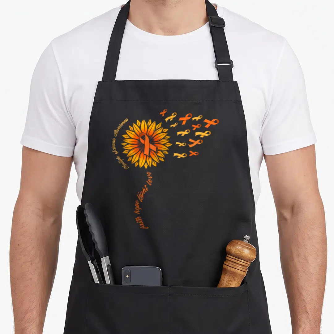 Warrior faith aprons - Sunflower with orange ribbon and text Multiple Sclerosis Awareness faith hope fight love — shown on a black cotton canvas apron against a white background