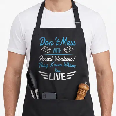 Postman carrier postal aprons - Stacked text Don't Mess With Postal Workers Two white envelopes blue line speed lines — shown on a black cotton canvas apron against a white background