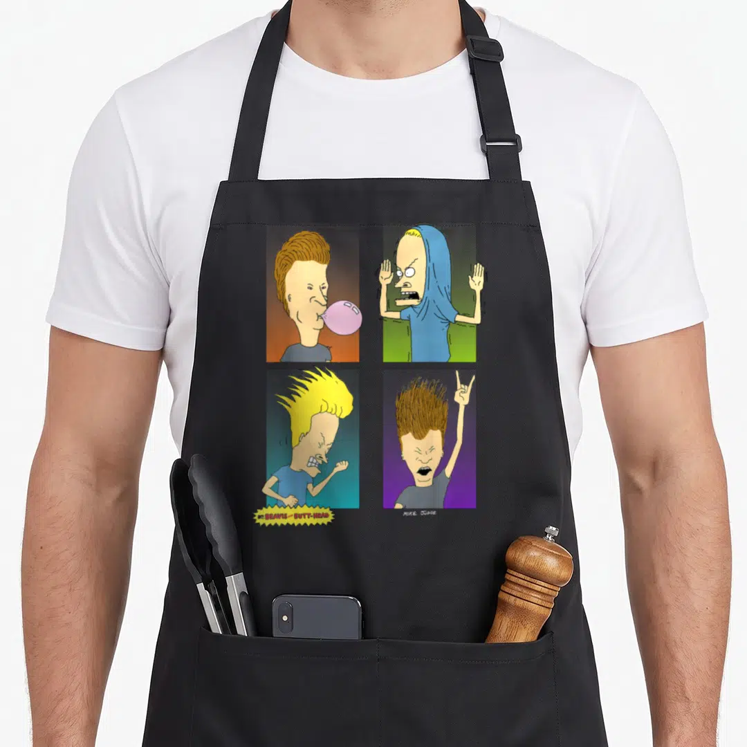 Beavis square apron - Four cartoon heads in grid with yellow pink blue green purple backgrounds and title text — shown on a black cotton canvas apron against a white background
