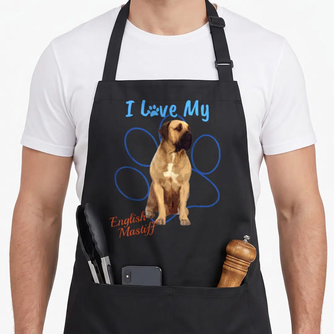Mastiff paw dog apron - Cartoon English Mastiff sitting in blue paw print outline with I Love My text — shown on a black cotton canvas apron against a white background
