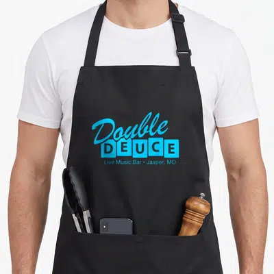 Deuce double apron - Light blue Double DEUCE script over five squares with Live Music Bar Jasper MO text — shown on a black cotton canvas apron against a white background