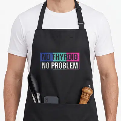 Problem thyroid apron - NO THYROID NO PROBLEM text in blue teal pink rectangular frame — shown on a black cotton canvas apron against a white background