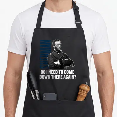 Sherman civil war apron - General Sherman photo with vertical blue text and white quote below — shown on a black cotton canvas apron against a white background