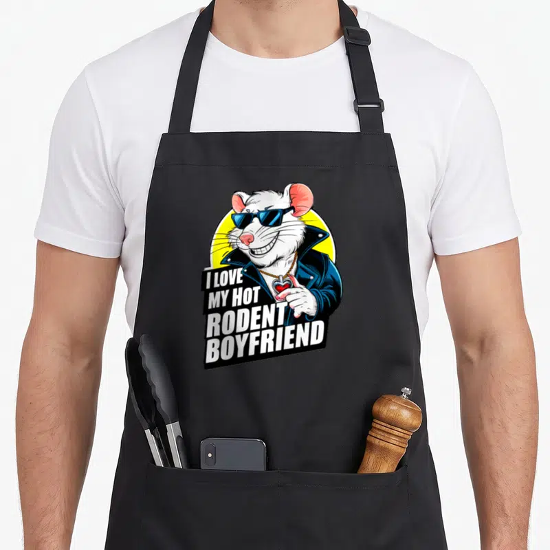 Vintage hot i love my mouse apron - Cartoon white rat in blue sunglasses holding red heart beside stacked text reading — shown on a black cotton canvas apron against a white background