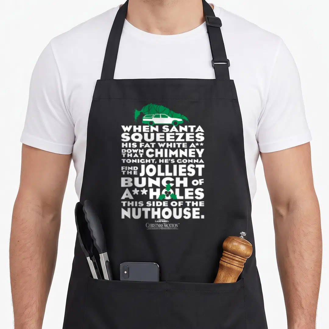 Letter national lampoon's christmas vacation apron - White stacked text quote with green car and biohazard symbol — shown on a black cotton canvas apron against a white background