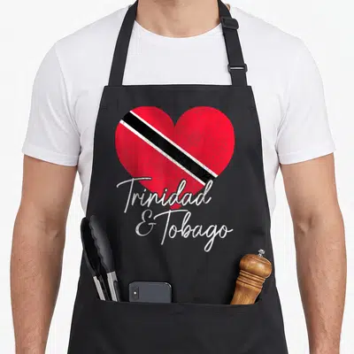 Tobago trinidadian girl apron - Red heart with black white stripe and white script text Trinidad & Tobago — shown on a black cotton canvas apron against a white background
