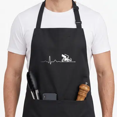 Sprint racing apron - White line-art off-road vehicle on a horizontal heartbeat pulse line — shown on a black cotton canvas apron against a white background