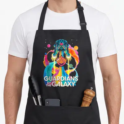 Galaxy rainbow apron - Cartoon robot with colorful swirls and GUARDIANS OF THE GALAXY text — shown on a black cotton canvas apron against a white background