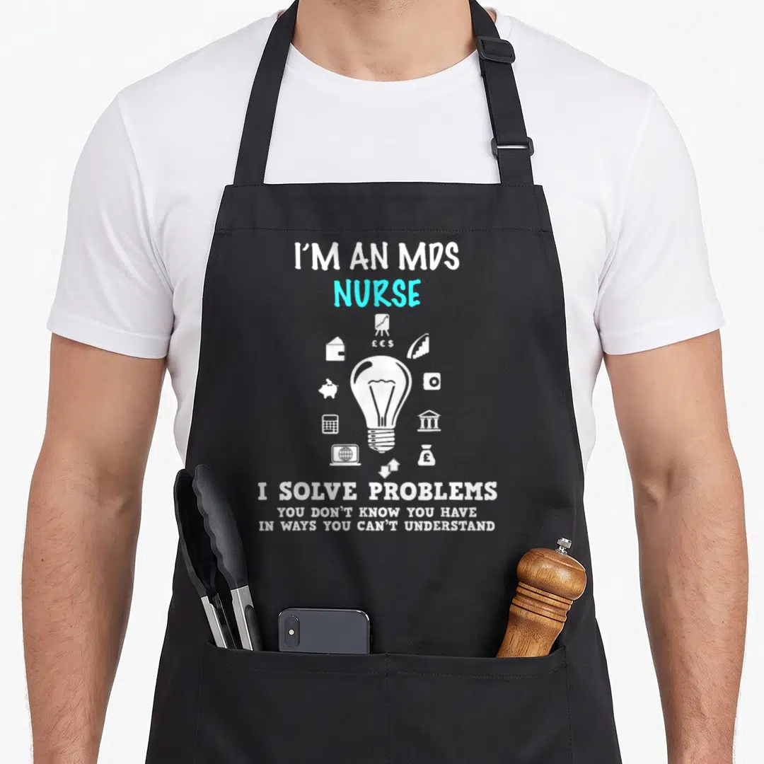 Mds nursing student apron - Lightbulb surrounded by wallet piggy bank calculator laptop and currency symbols with white — shown on a black cotton canvas apron against a white background